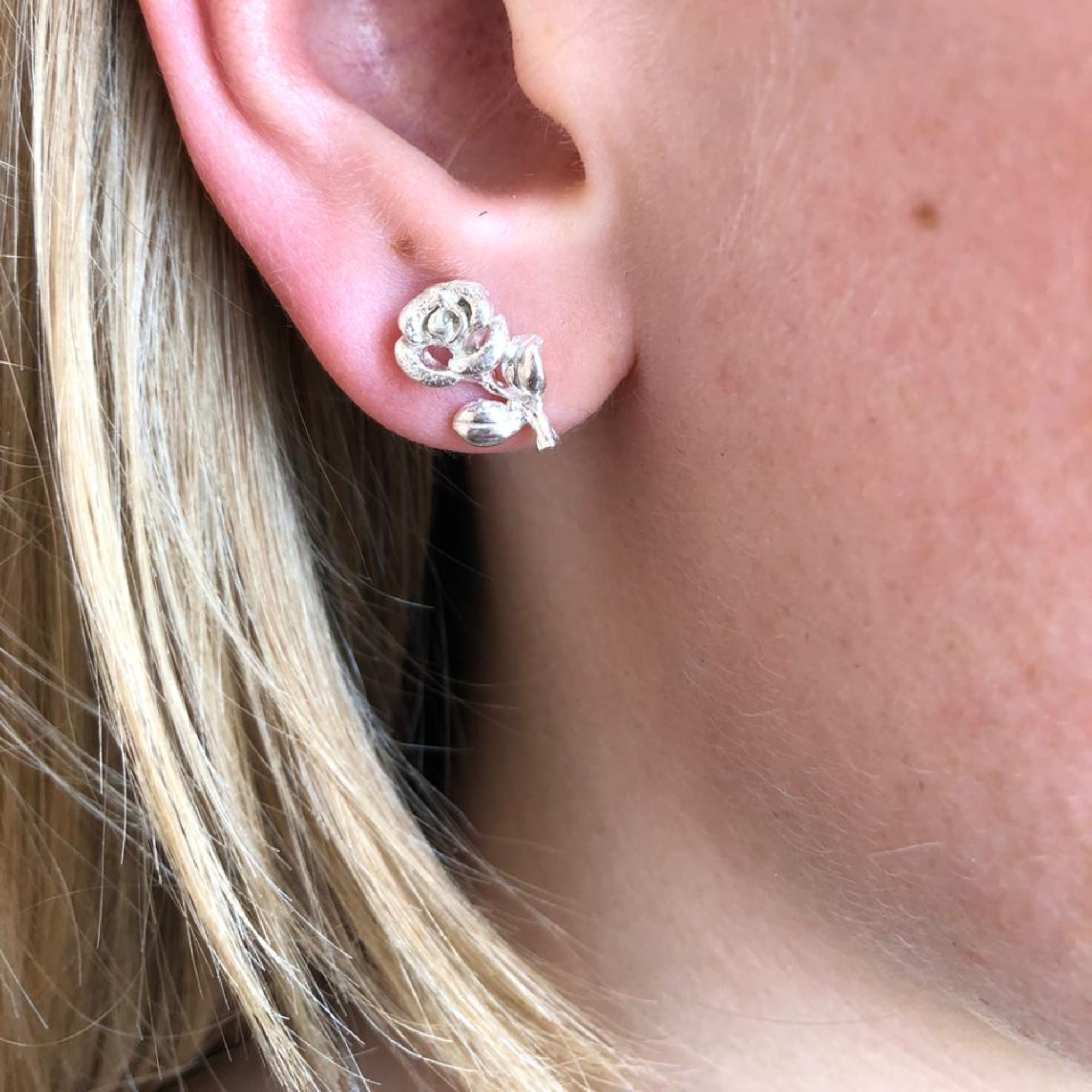 Rose with leaf studs
